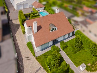 Huis met magazijn te koop Lendelede
