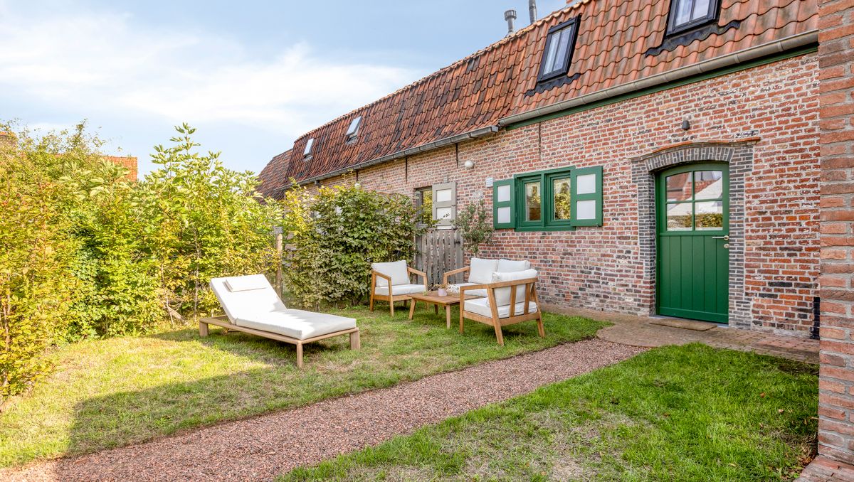 Een gerenoveerd meesterwerk in hartje Hansbeke