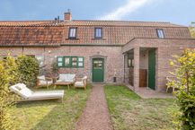 Een gerenoveerd meesterwerk in hartje Hansbeke