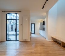 Koetshuis met 2 slaapkamers en tuin te huur in centrum Gent