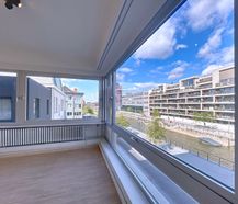 Ruim gerenoveerd appartement te huur aan de Leie te Kortrijk