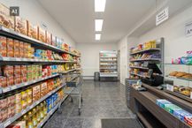 Handelspand met woonst te koop in Mechelen.