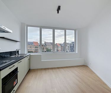Lichtrijke studio op toplocatie aan de Leiekaai in Gent