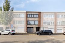 Huis te koop in Merksem met tuin en garage
