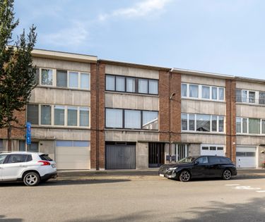 Huis te koop in Merksem met tuin en garage
