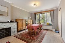 Huis te koop in Merksem met tuin en garage