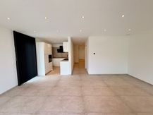 Gelijkvloers nieuwbouw appartement te huur in Genk.