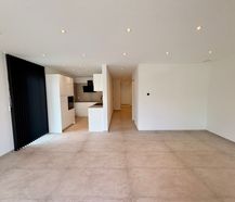 Gelijkvloers nieuwbouw appartement te huur in Genk.
