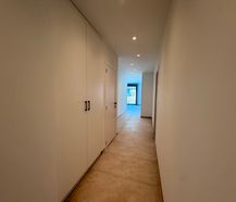Gelijkvloers nieuwbouw appartement te huur in Genk.