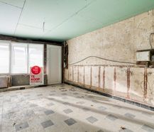 Handelspand met appartement en atelier te koop in Adegem
