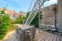 Maison en bel-étage avec 4 chambres, garage et jardin ! 