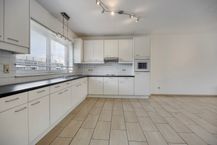 Instapklaar appartement met zuidgericht terras nabij centrum Diepenbeek 