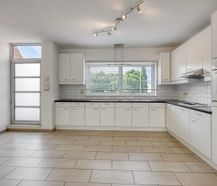 Instapklaar appartement met zuidgericht terras nabij centrum Diepenbeek