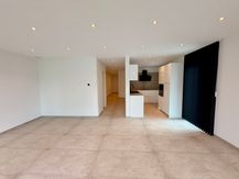 Gelijkvloers nieuwbouw appartement te huur in Genk.