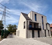 Gelijkvloers nieuwbouw appartement te huur in Genk.