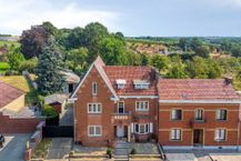 Huis met 5 slaapkamers en loods te koop in Sint-Truiden