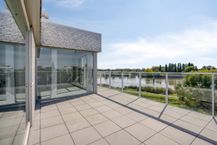 Recent dakappartement te koop in Boom met zicht op het water